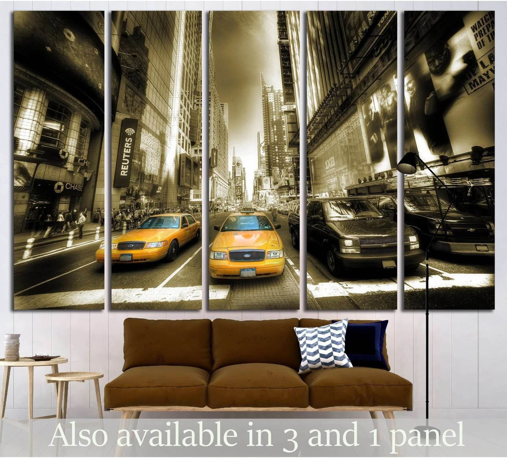 Times Square canvas print with yellow taxis on a sepia Manhattan street, hung above a sofa