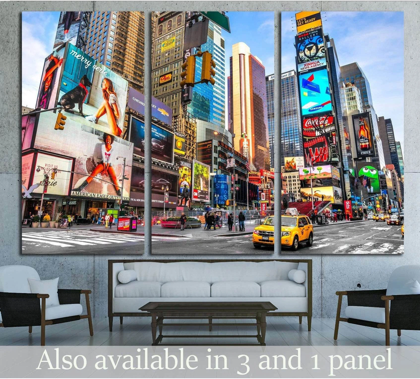Times Square NYC canvas print with yellow taxi and billboards, displayed above a sofa in a modern living room