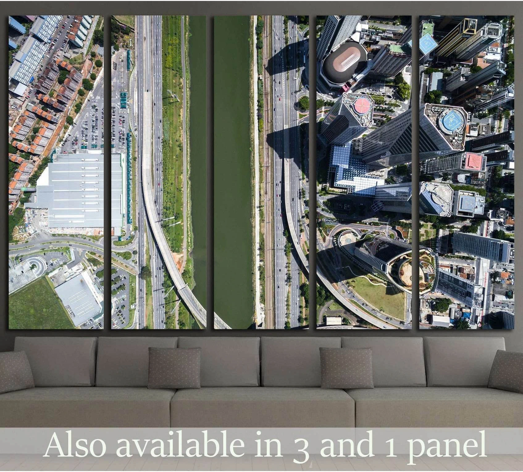 São Paulo aerial canvas print with river, highways, and skyscrapers above a sofa