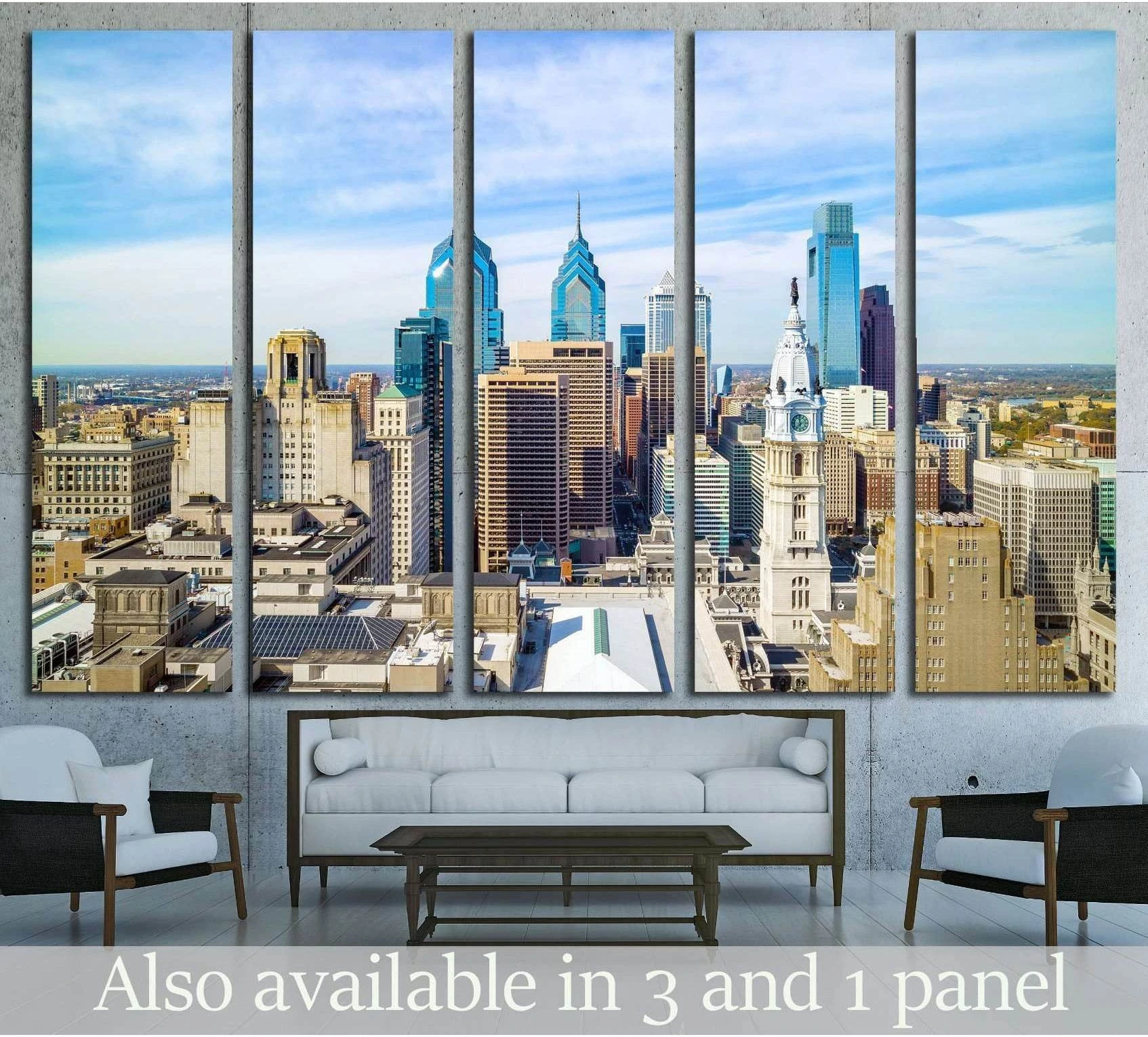 Philadelphia skyline canvas print in five-panel layout above sofa in a modern living room