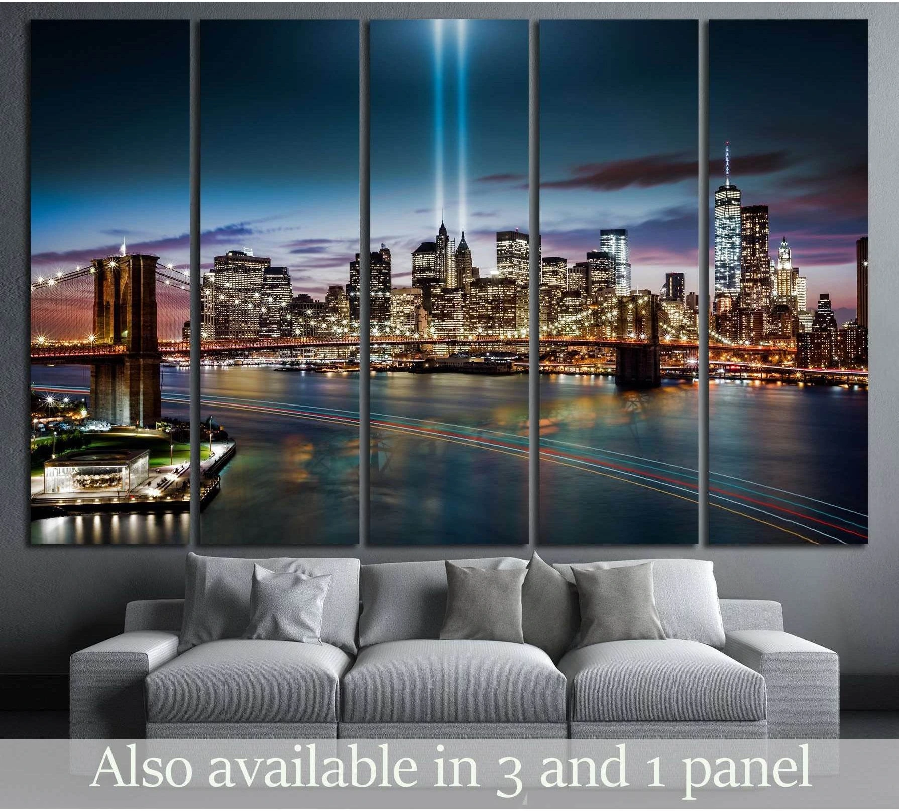 NYC skyline canvas print with Brooklyn Bridge and Tribute in Light above a gray sofa