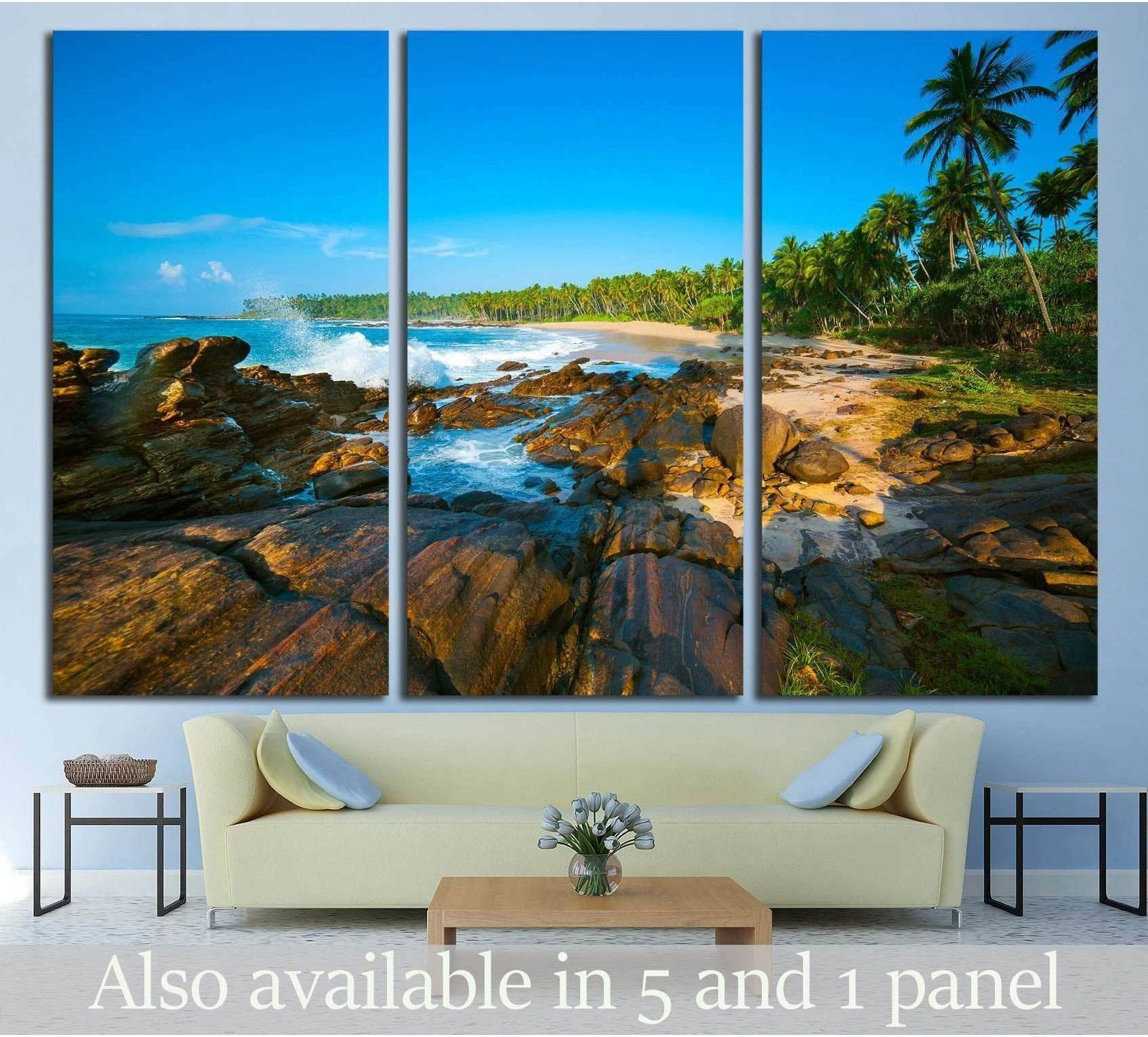 Tropical beach near Tangalle, Sri Lanka. Stones at foreground showing sea water, shoreline and horizon depth.
