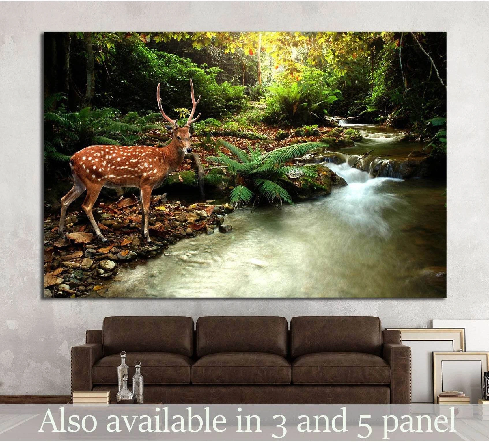 Sika deer canvas print beside a tropical stream with lush ferns above a sofa