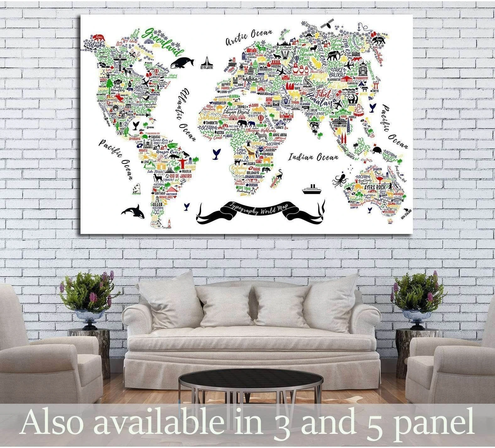 Typography world map canvas print with colorful city names and landmark icons above a sofa in a modern living room