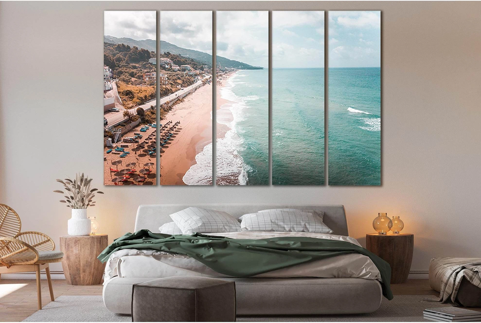 Beach seascape with turquoise ocean, sandy shore, dark umbrella rows and overcast clouds detail view