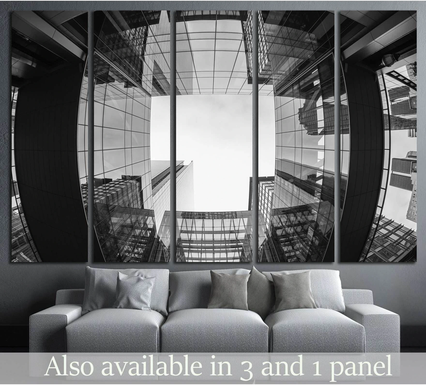 Black and white Charlotte skyline canvas print hung above a sofa in a modern living room