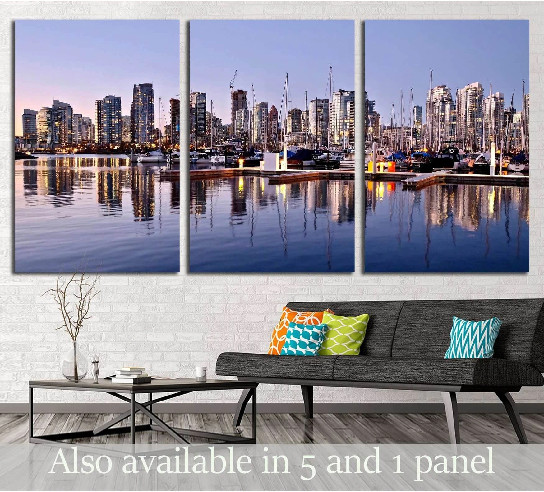 Vancouver skyline canvas print with marina sailboats at dusk, displayed as a triptych above a sofa