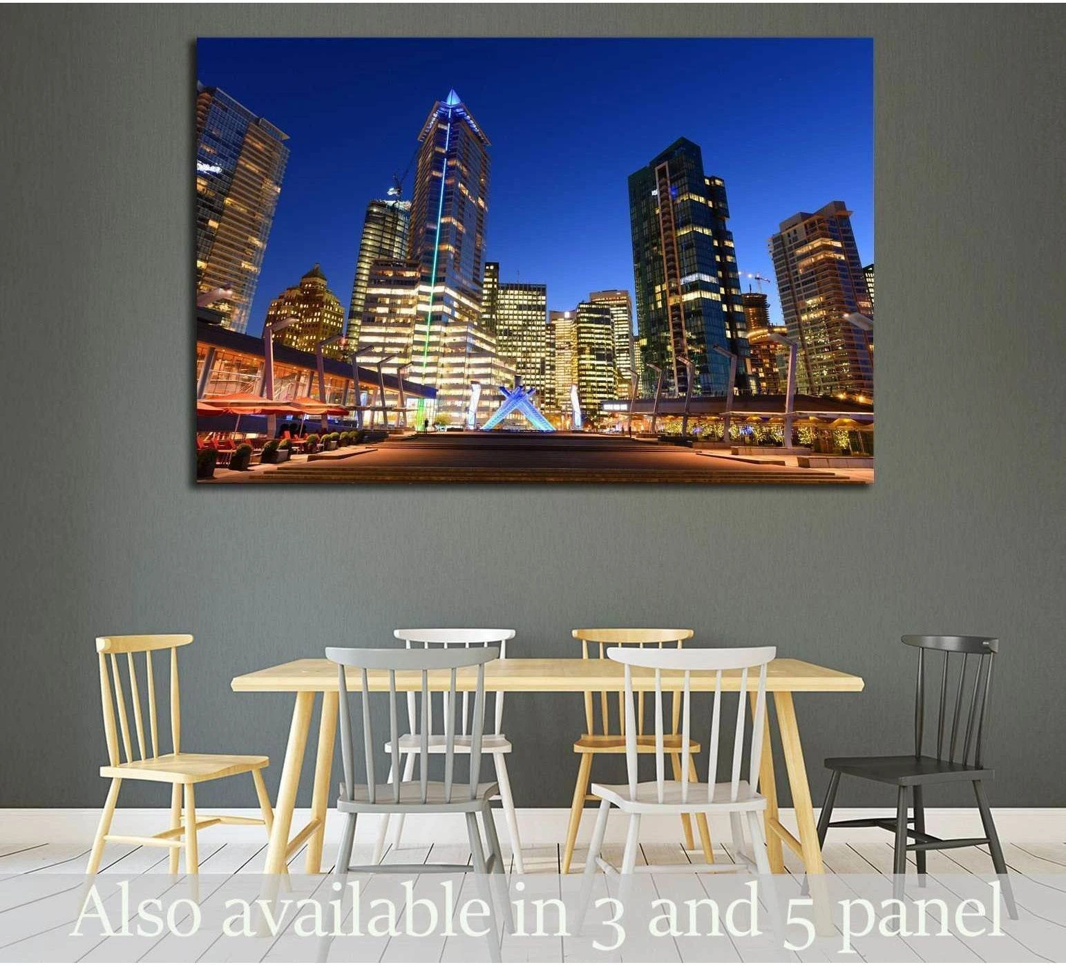 Vancouver skyline canvas print with lit downtown towers above a dining table at night