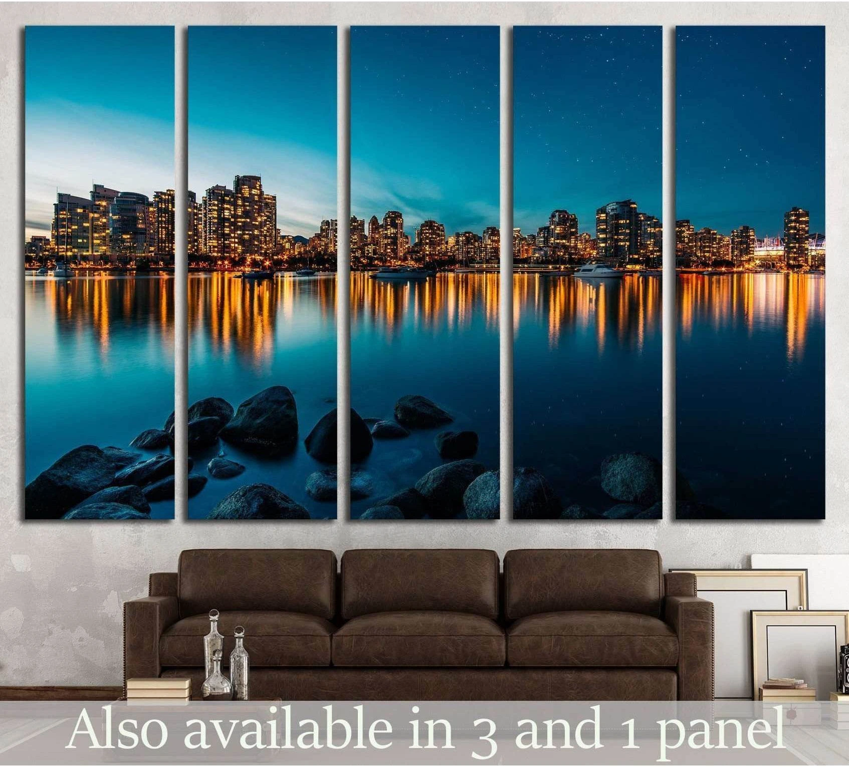 Vancouver skyline canvas print with blue harbor reflections and glowing city lights above a sofa