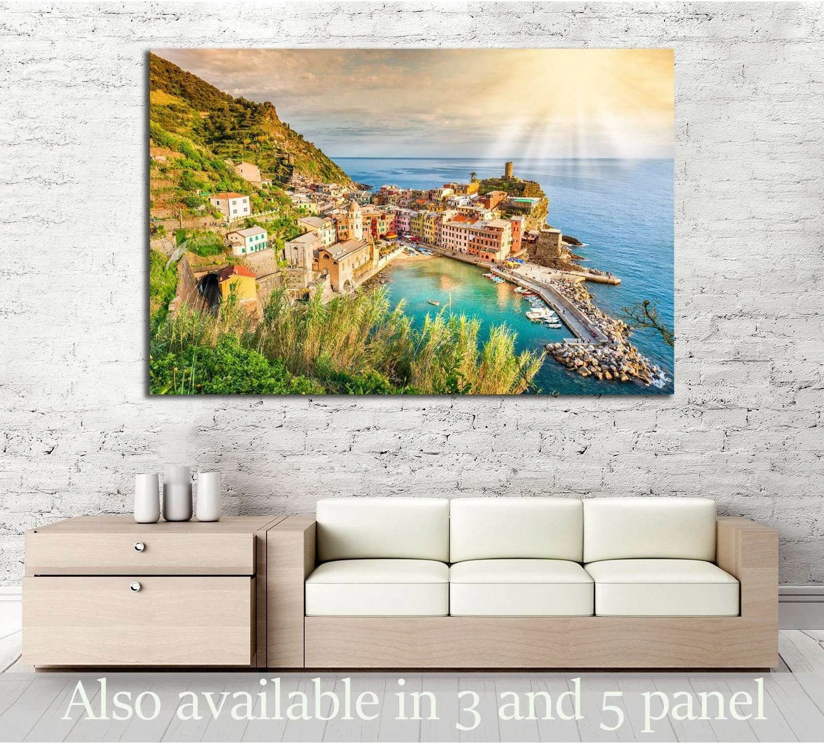 Vernazza Cinque Terre canvas print above a sofa with sunlit harbor, pastel village, and blue sea