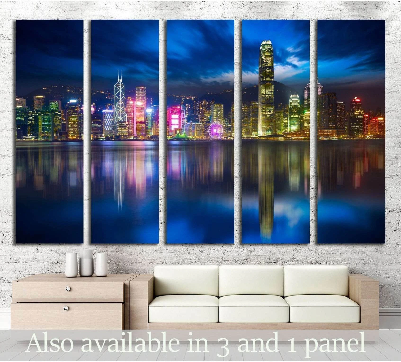 Hong Kong Victoria Harbour skyline canvas print at night with blue reflections, displayed above a sofa