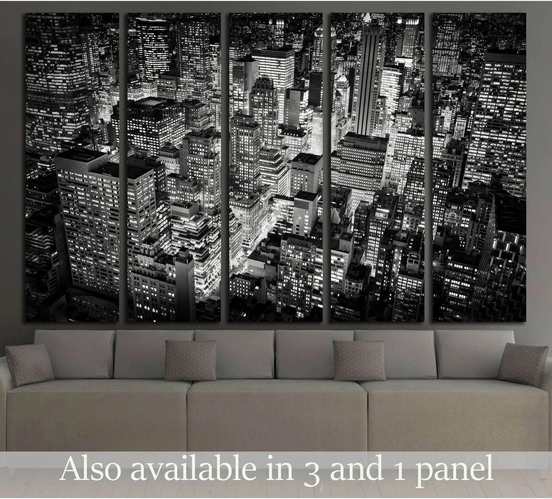 Black and white NYC skyline canvas print above sofa from Empire State Building view