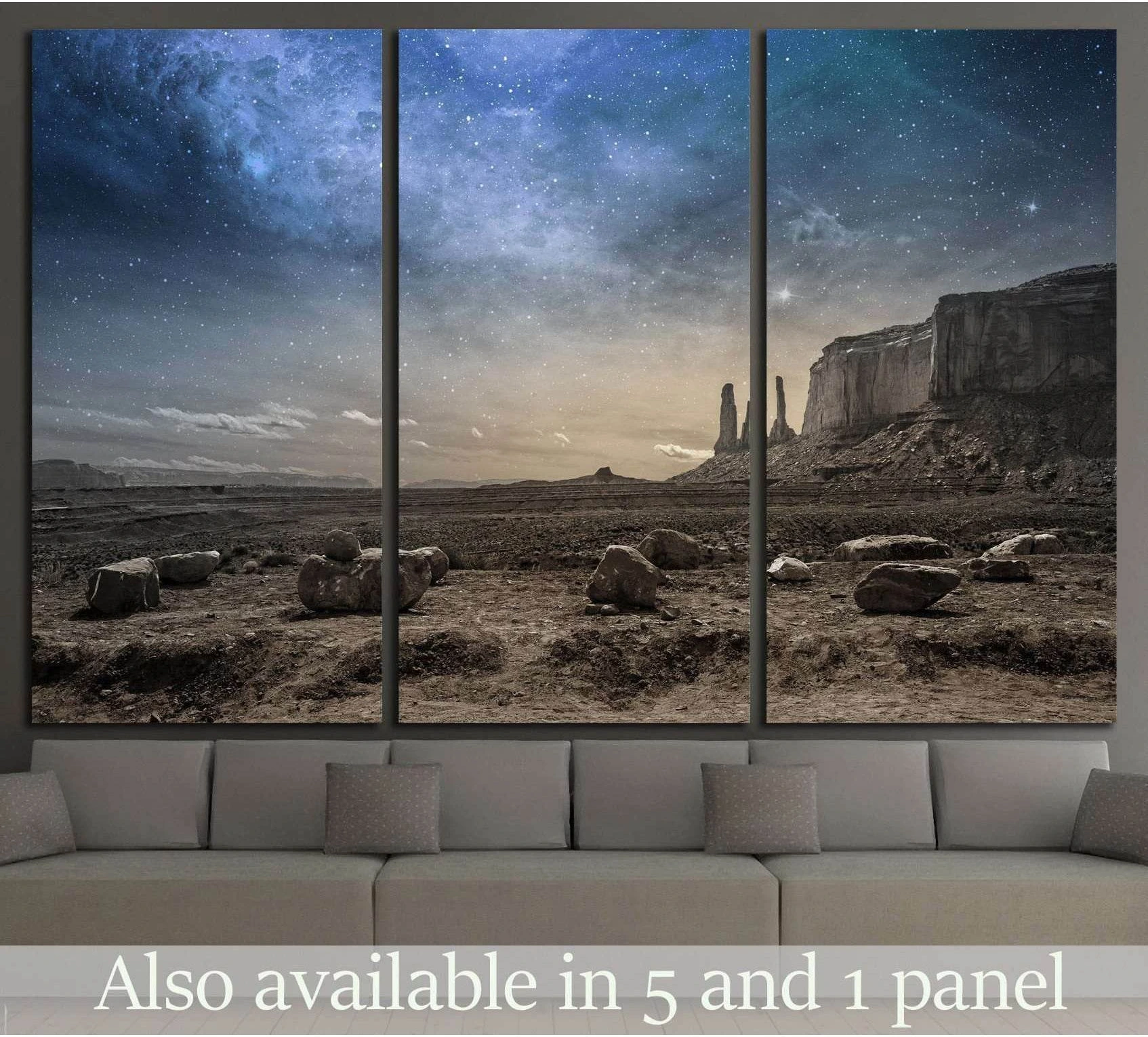 Rocky desert landscape canvas print with starry dusk sky and sandstone cliffs, shown as triptych above sofa