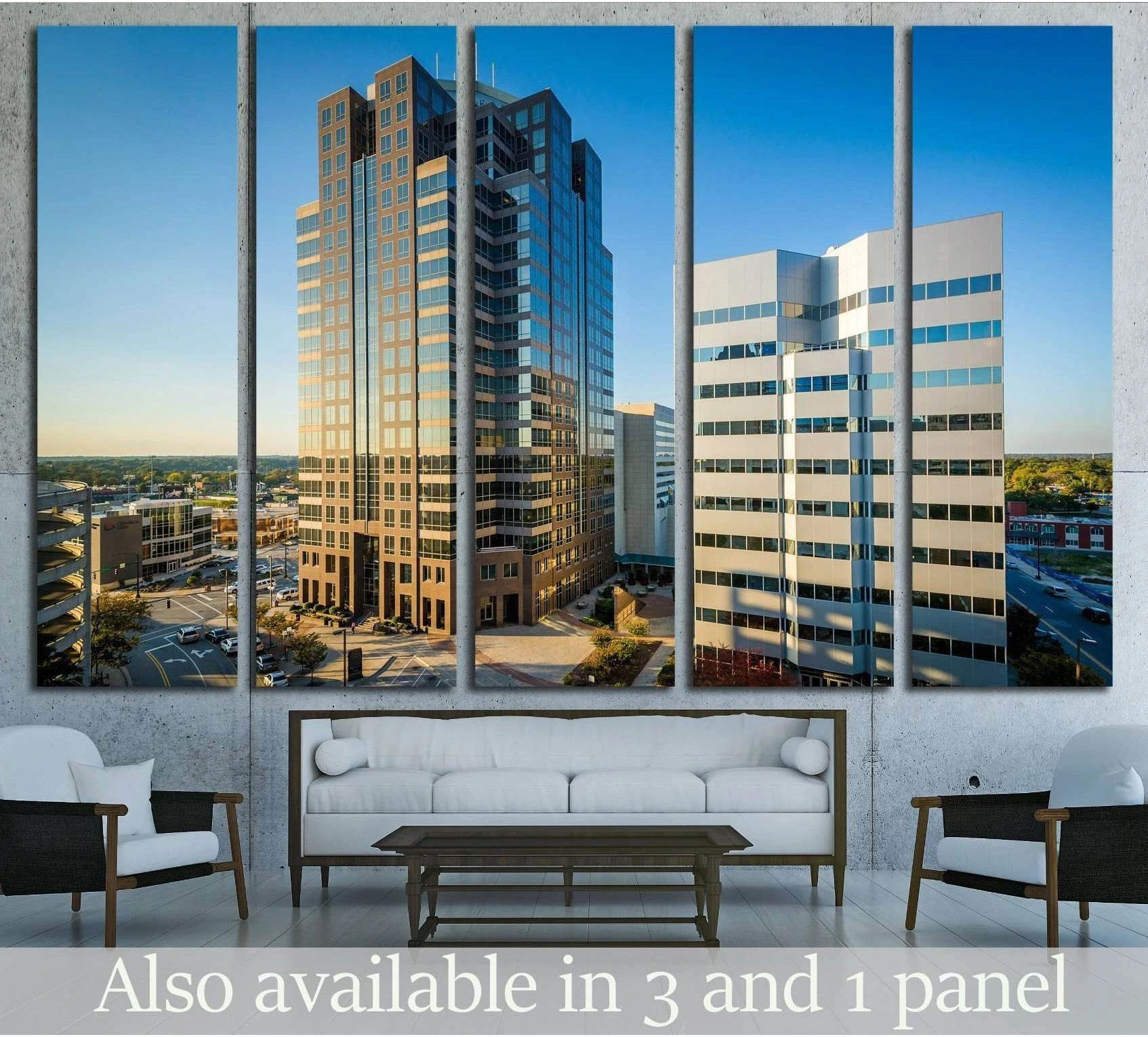 Greensboro downtown buildings canvas print shown as multi-panel wall art above a white sofa