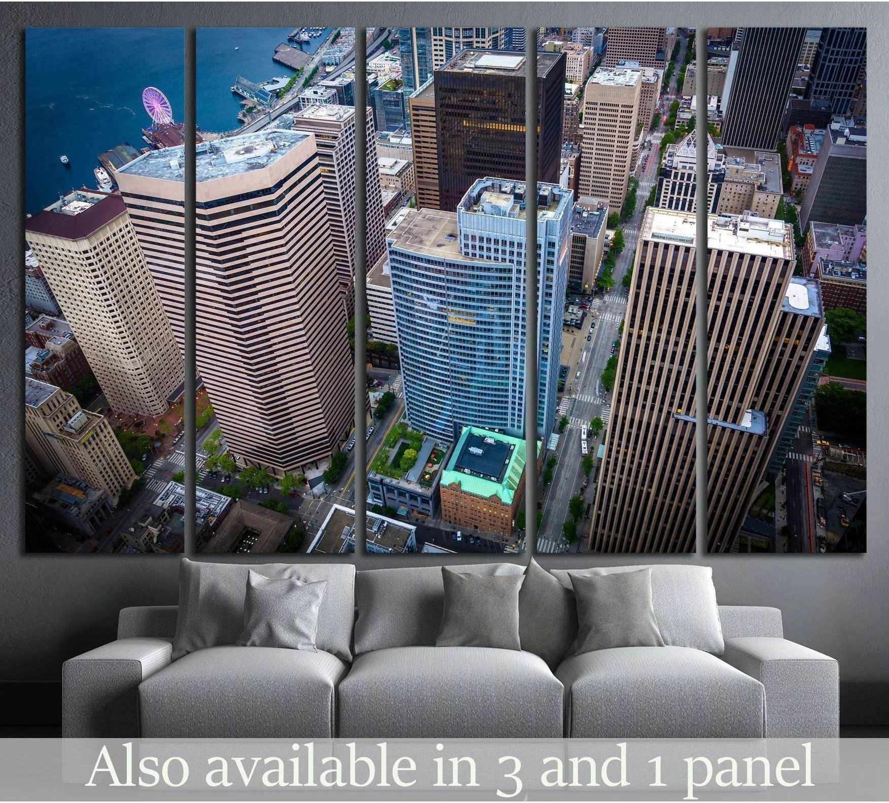 Seattle skyline canvas print with downtown skyscrapers, waterfront, and Great Wheel above a gray sofa