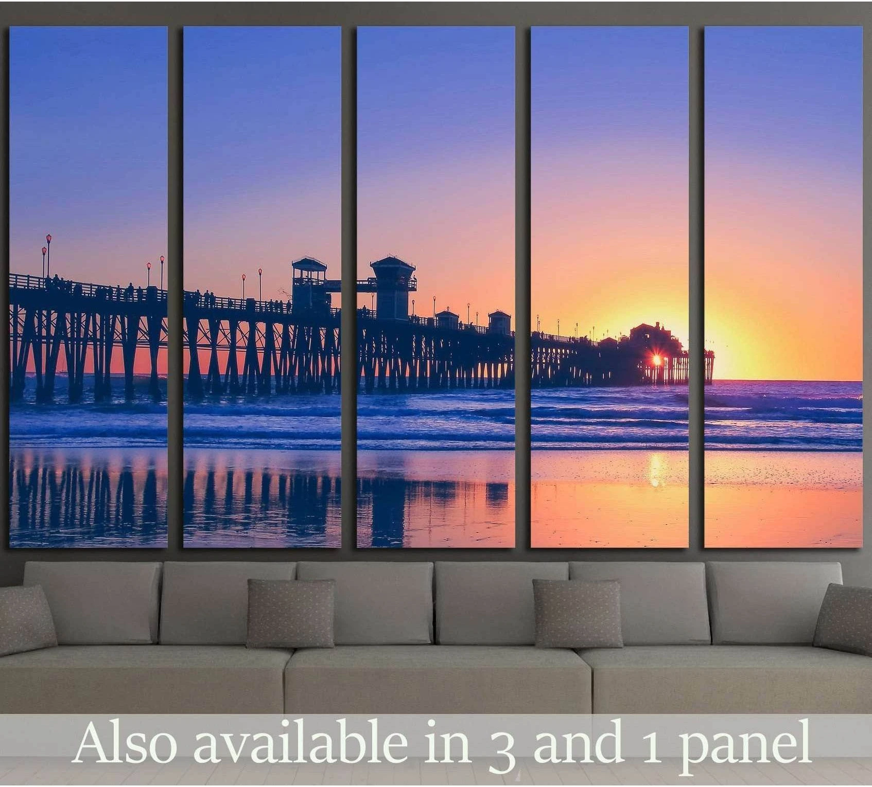California pier sunset canvas print hung above sofa in a modern living room