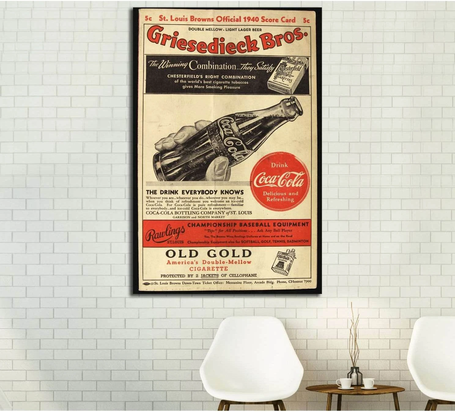 Vintage Coca Cola advertisement canvas print hung above chairs on a white brick wall