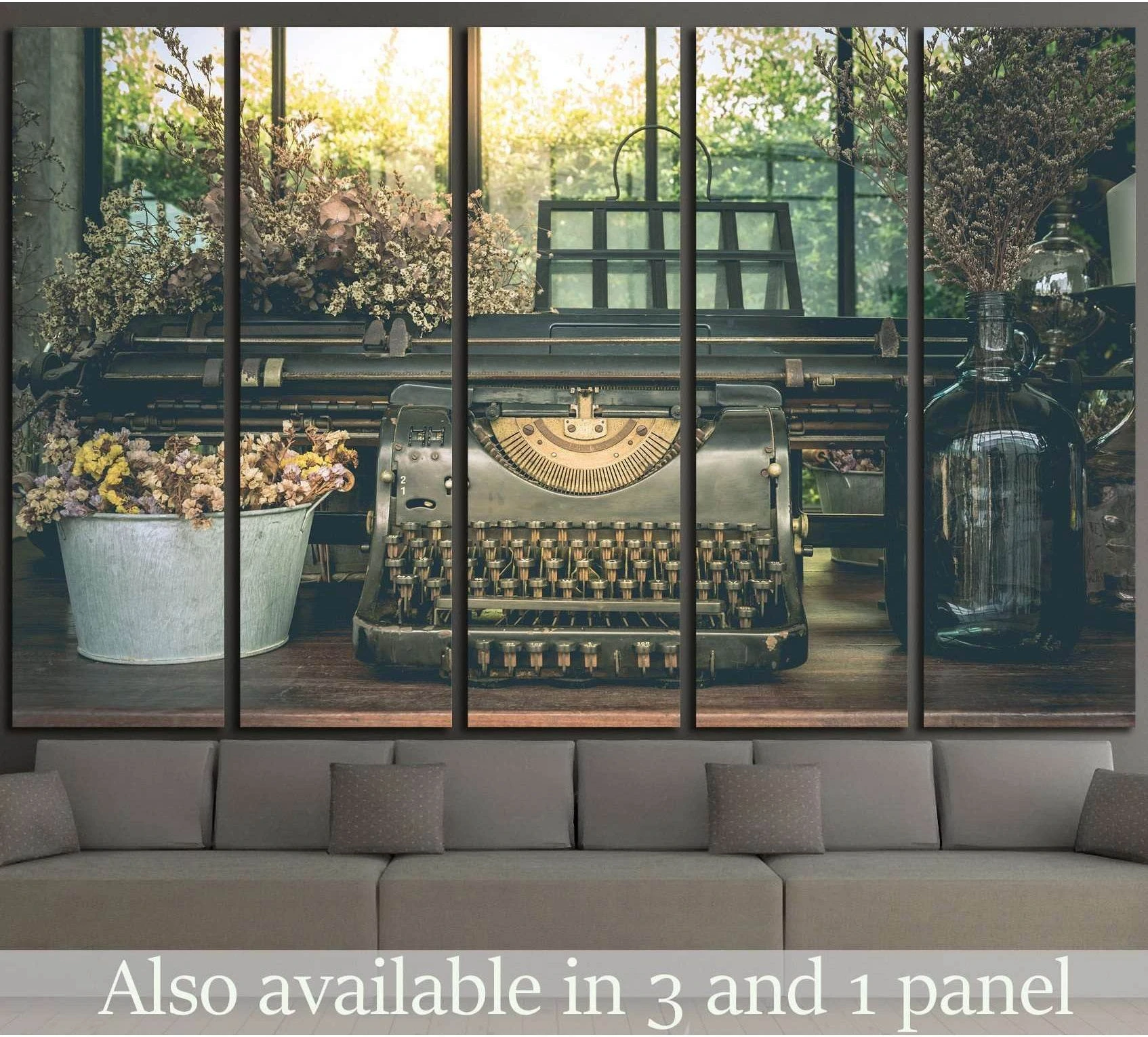 Vintage typewriter canvas print with dried flowers and glass bottle by a sunlit window