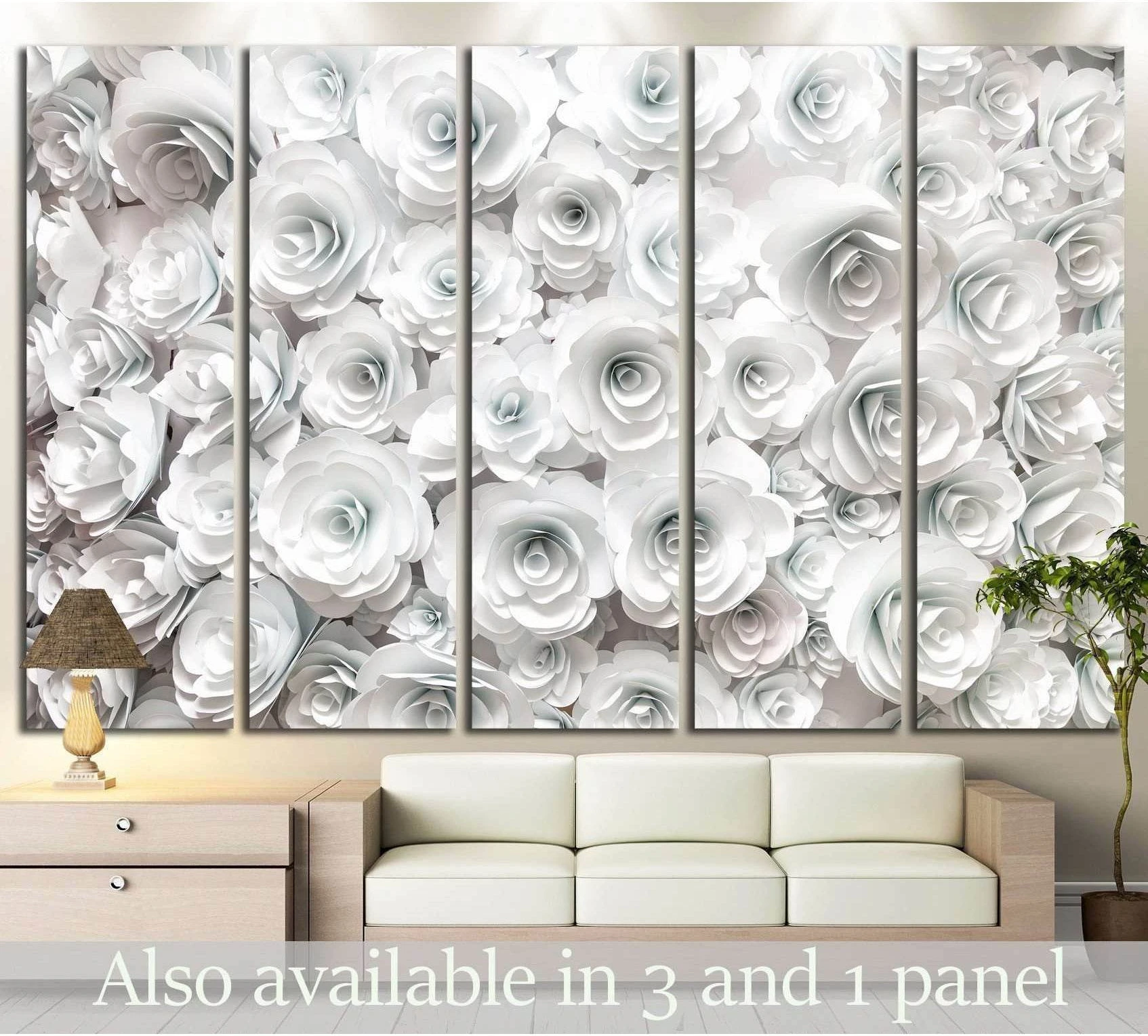 Layered white paper roses canvas print in soft ivory tones above a sofa in a neutral living room
