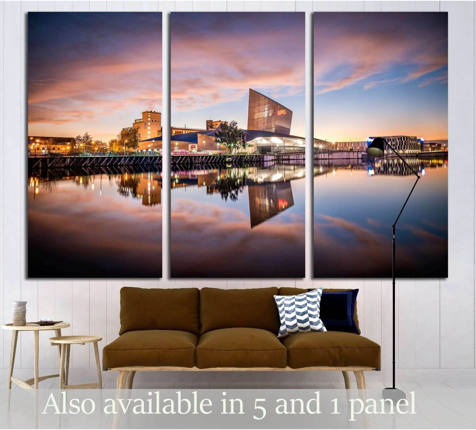 Manchester War Museum canvas print at Salford Quays with sunset canal reflections above a sofa in a modern living room