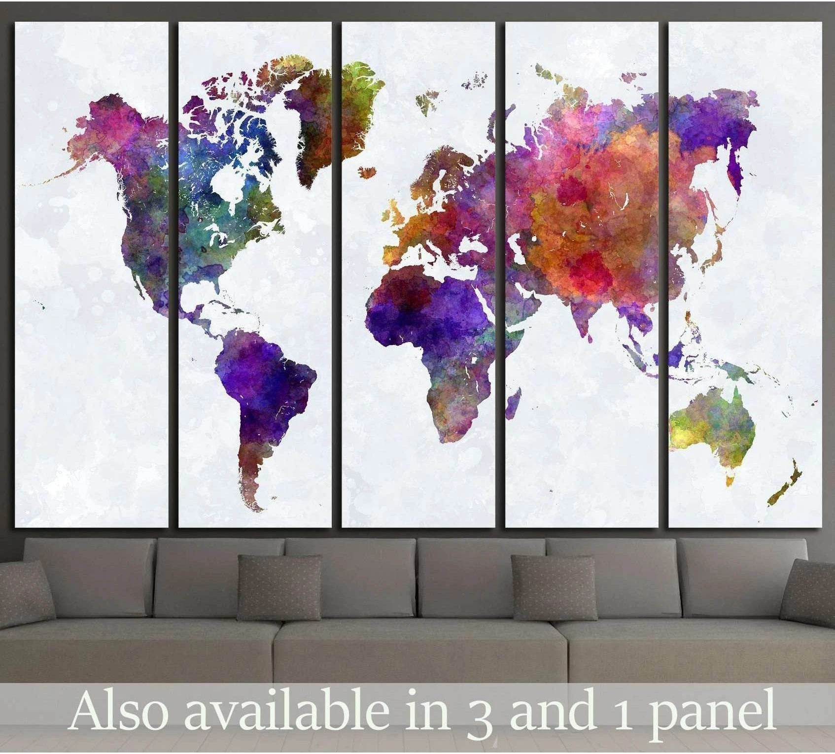 Colorful watercolor world map canvas print in five panels above a sofa in a modern living room