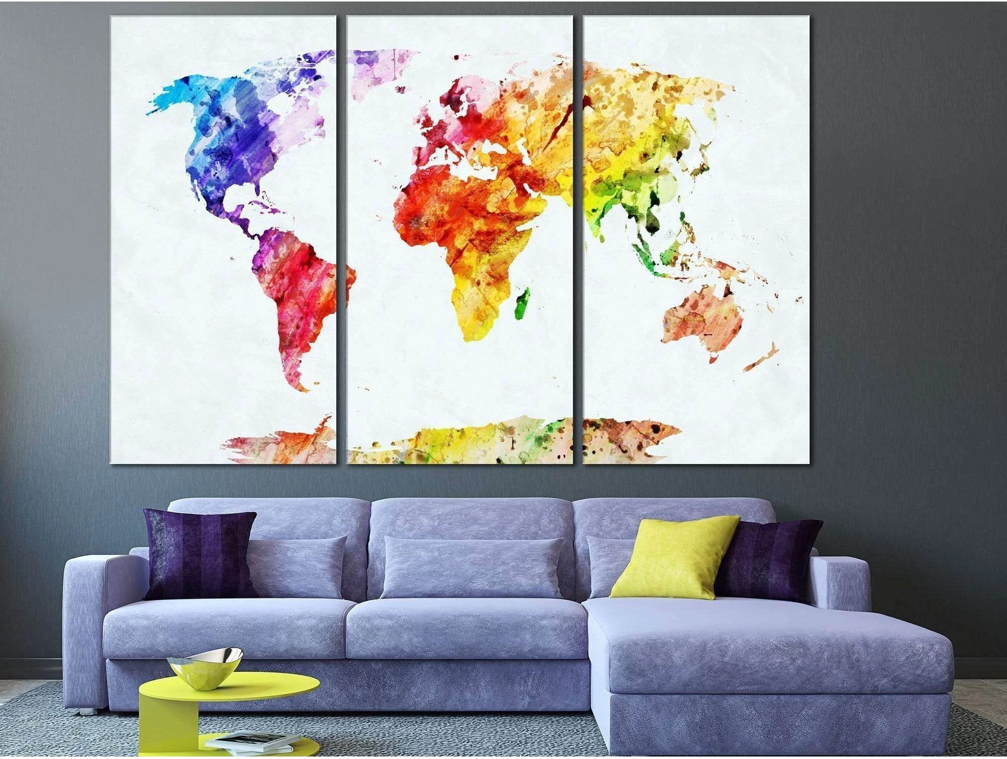 Five-panel watercolor world map with rainbow colour washes on a white background detail view