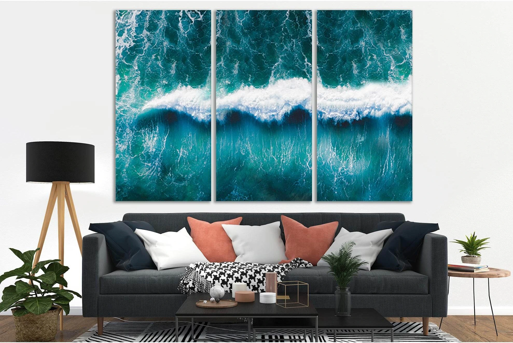 Teal ocean wave artwork with bright white foam breaking across the centre detail view