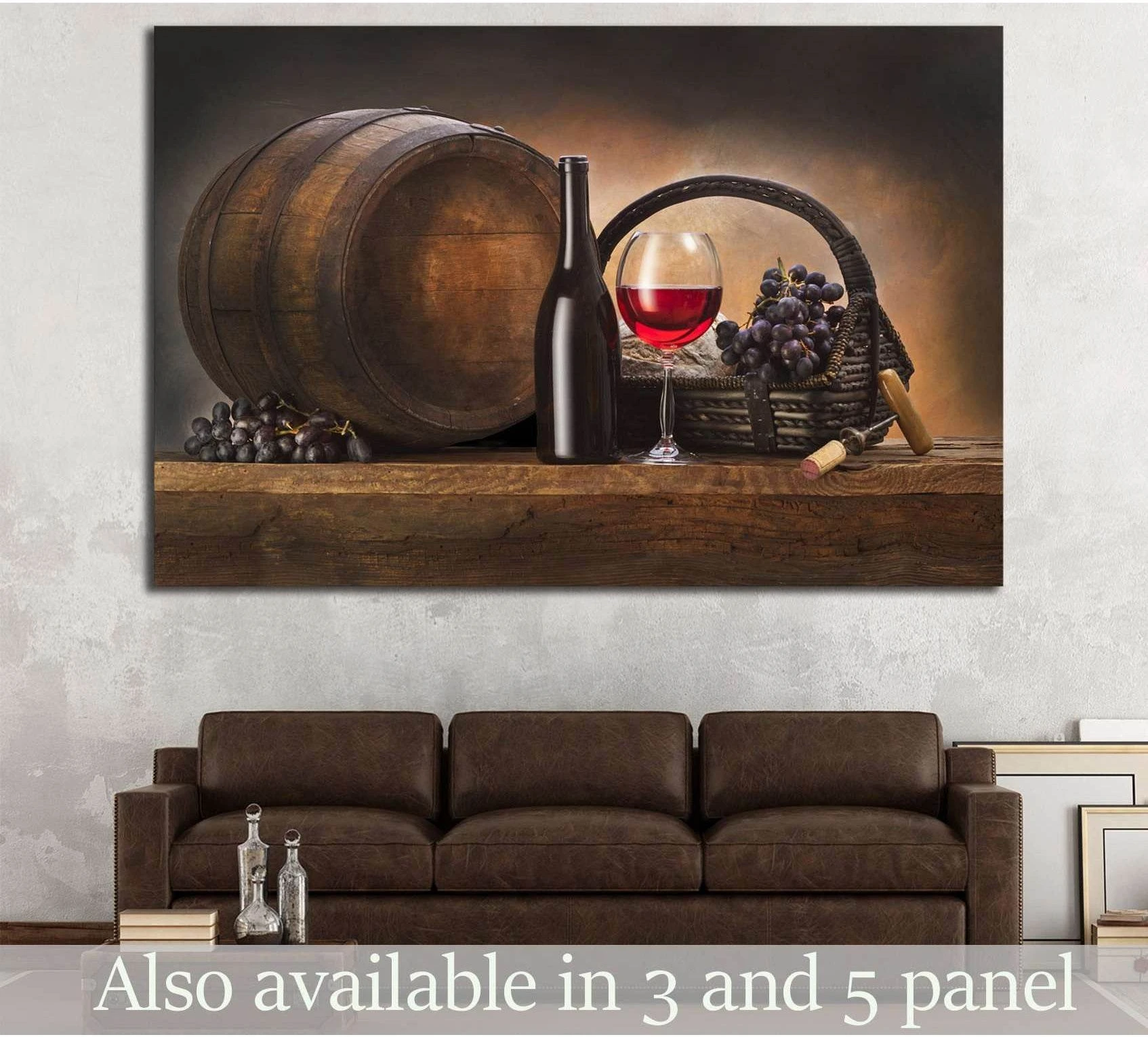 Wine barrel still life canvas print with red wine glass, bottle, grapes, and basket above a sofa