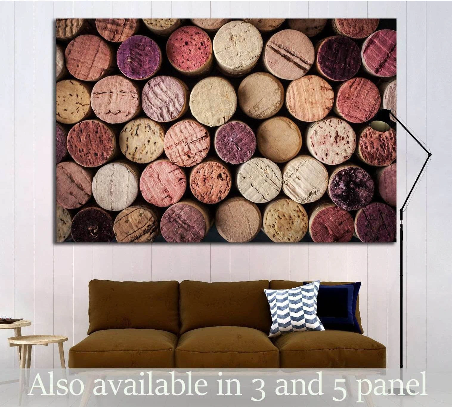 Wine corks canvas print hung above brown sofa in a modern kitchen or wine bar interior
