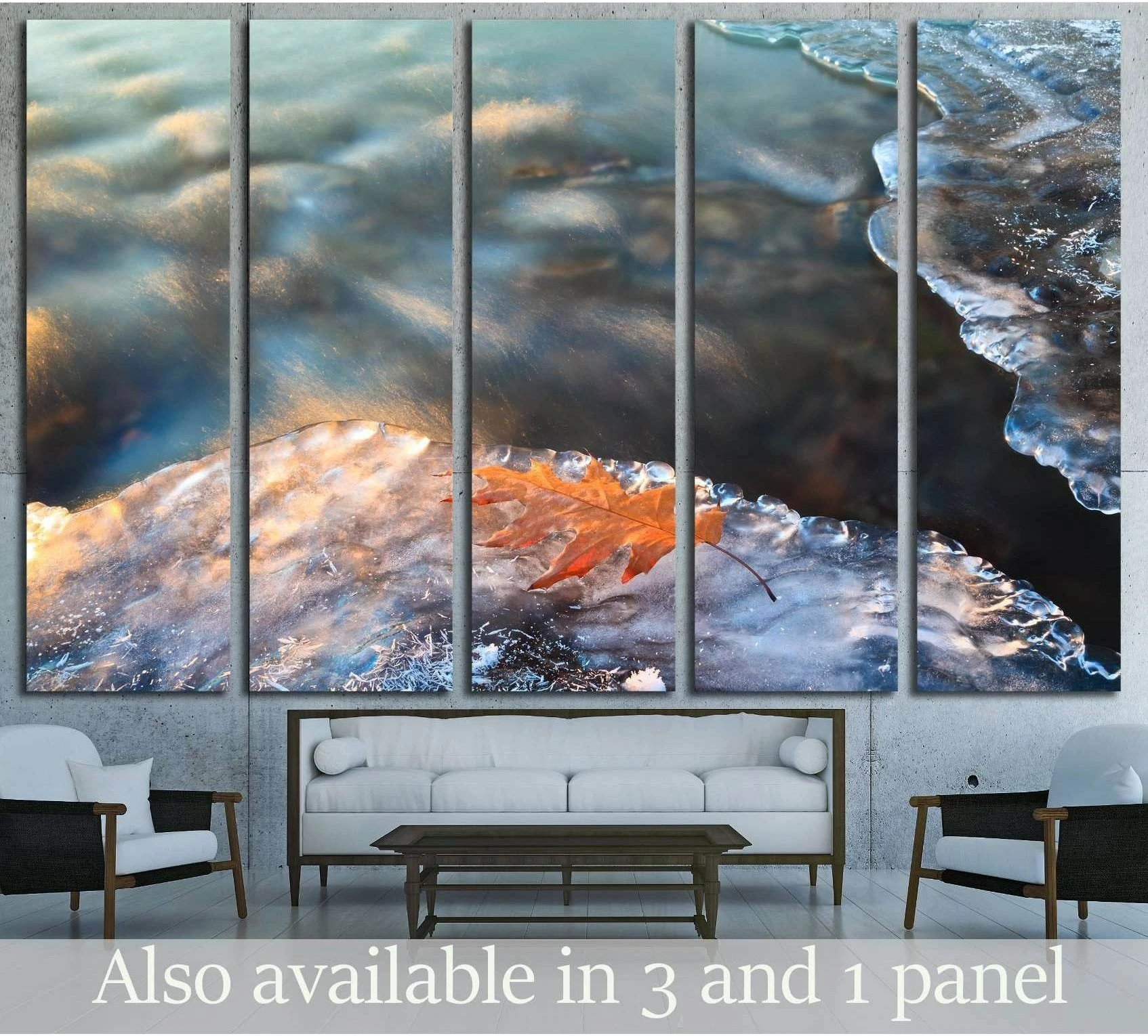 Orange leaf on icy blue stream canvas print displayed as multi-panel wall art above a sofa