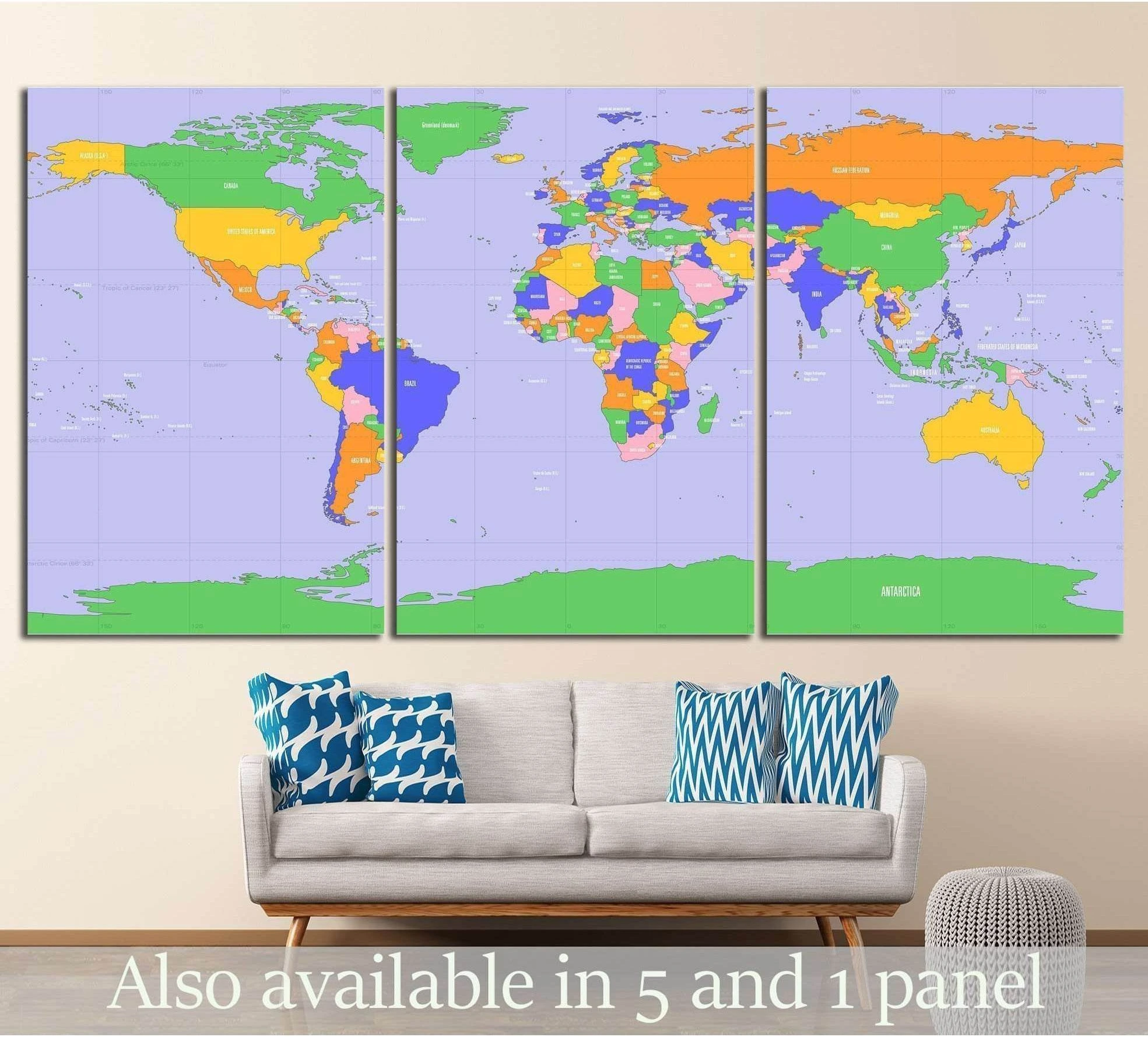 Triptych world map canvas print with multicolor countries and lavender oceans above a sofa
