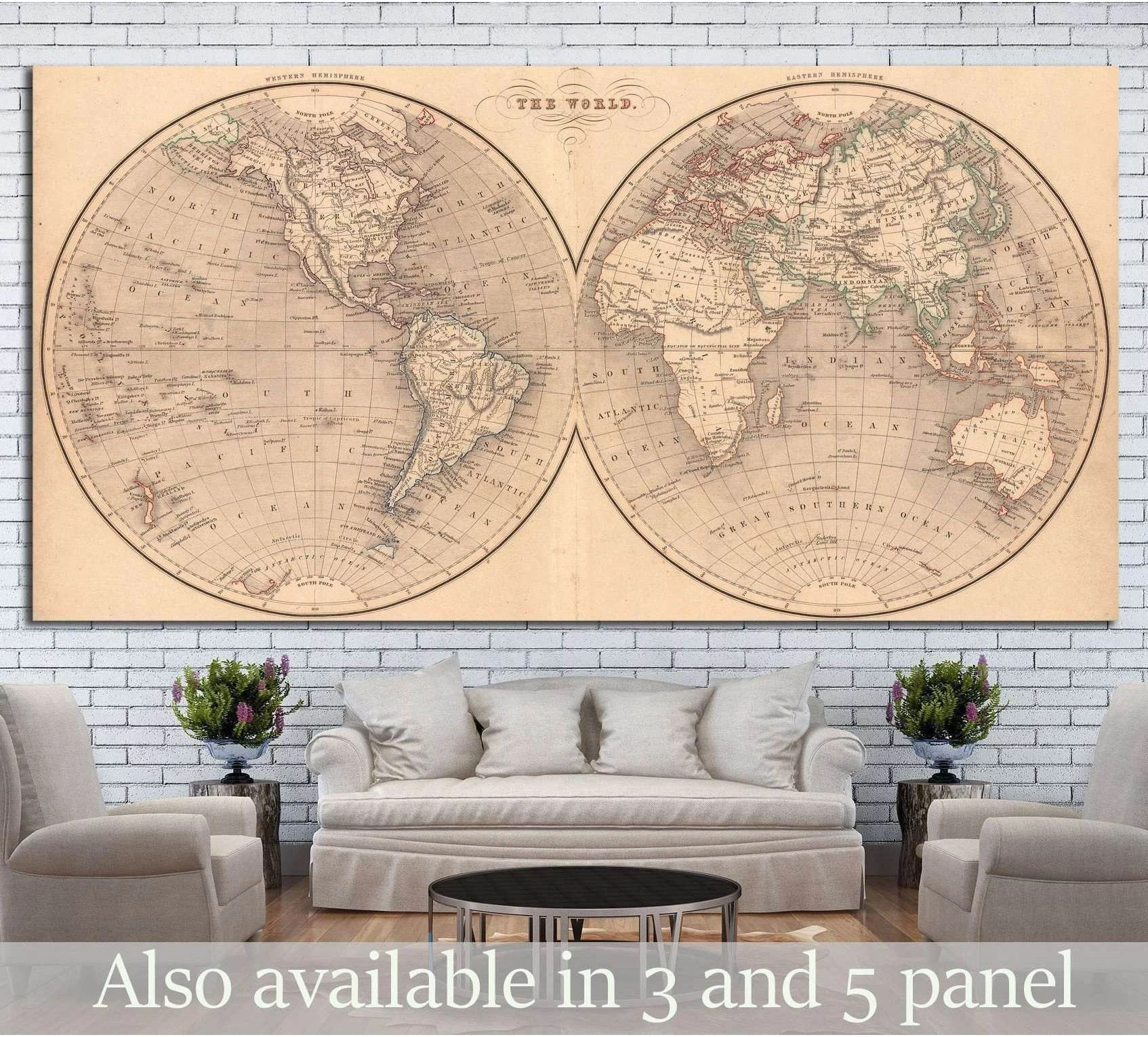 Vintage world map canvas print above sofa in a neutral living room with antique atlas styling