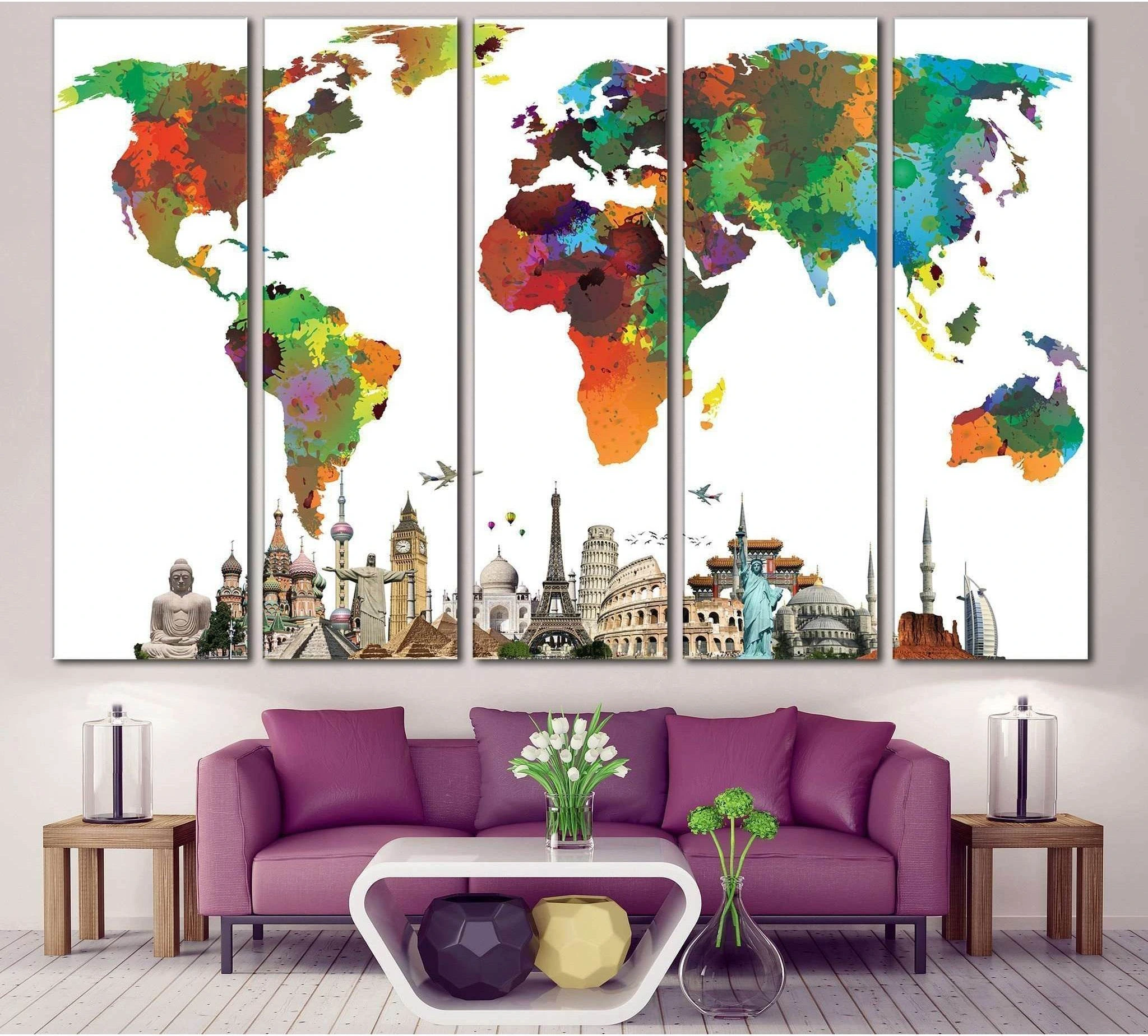 Colorful world map canvas print with landmark collage above sofa in a modern living room